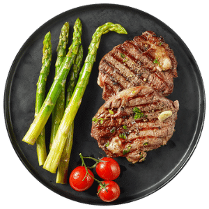 Grilled beef steaks with asparagus and cherry tomatoes