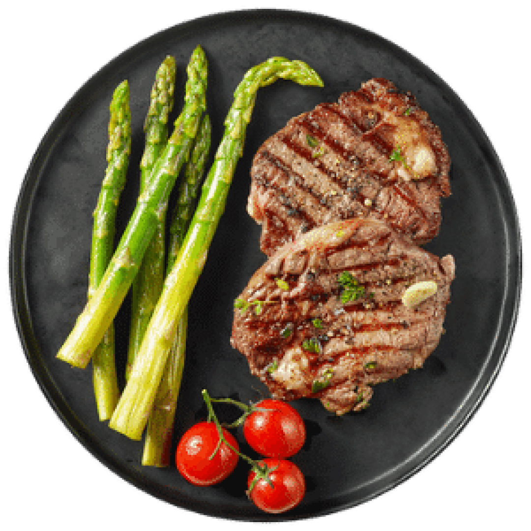 Grilled beef steaks with asparagus and cherry tomatoes